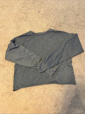 Long Sleeve free people‼️open back shirt. Grey